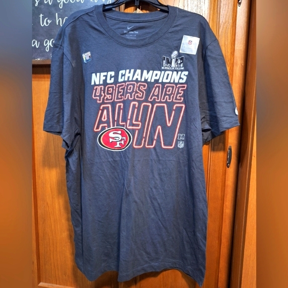 A Nike official NFL San Francisco 49ers  NFC Champions short sleeve t-shirt. NWT - Picture 1 of 8